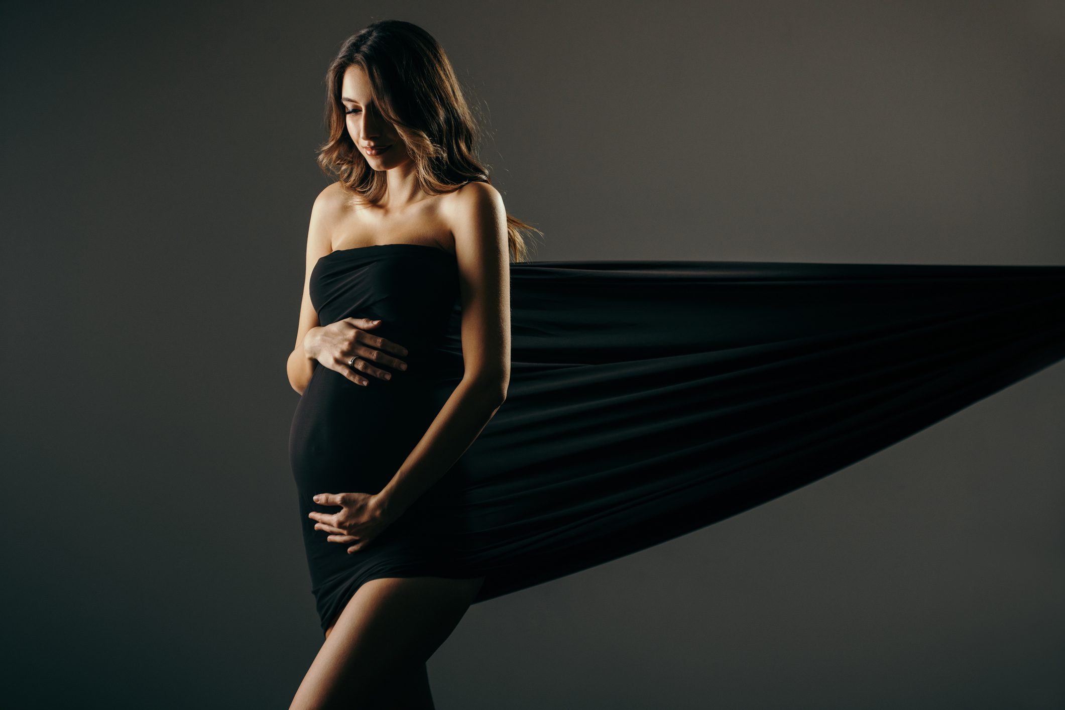 Pregnant woman in black dress
