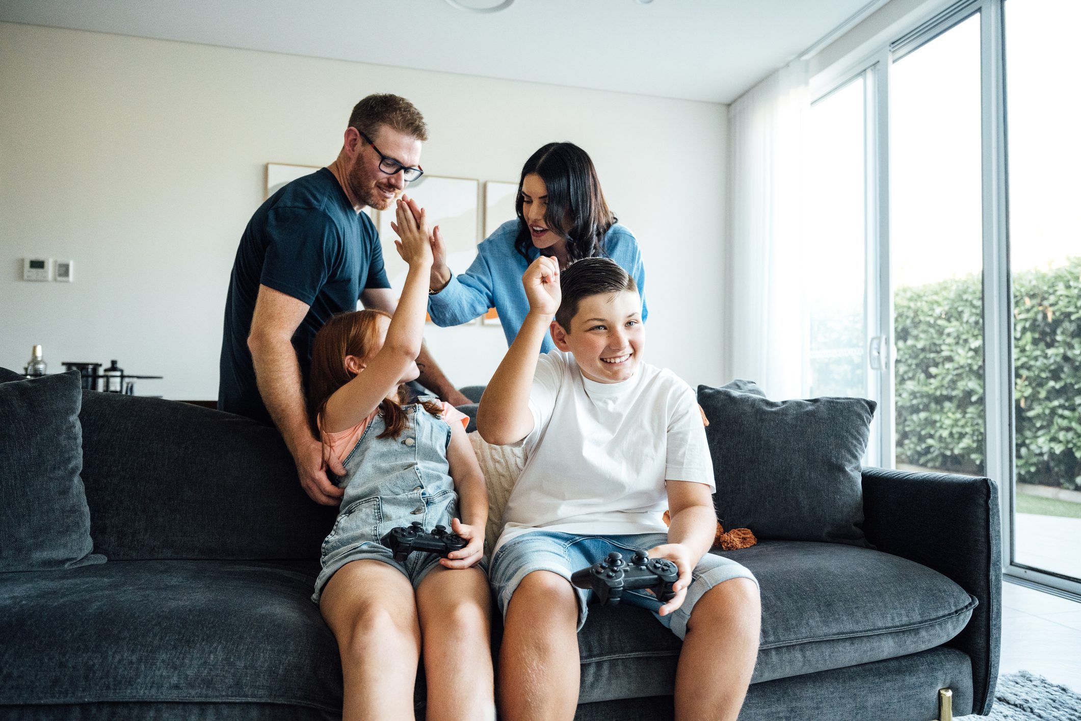 Parents and kids enjoying a game day