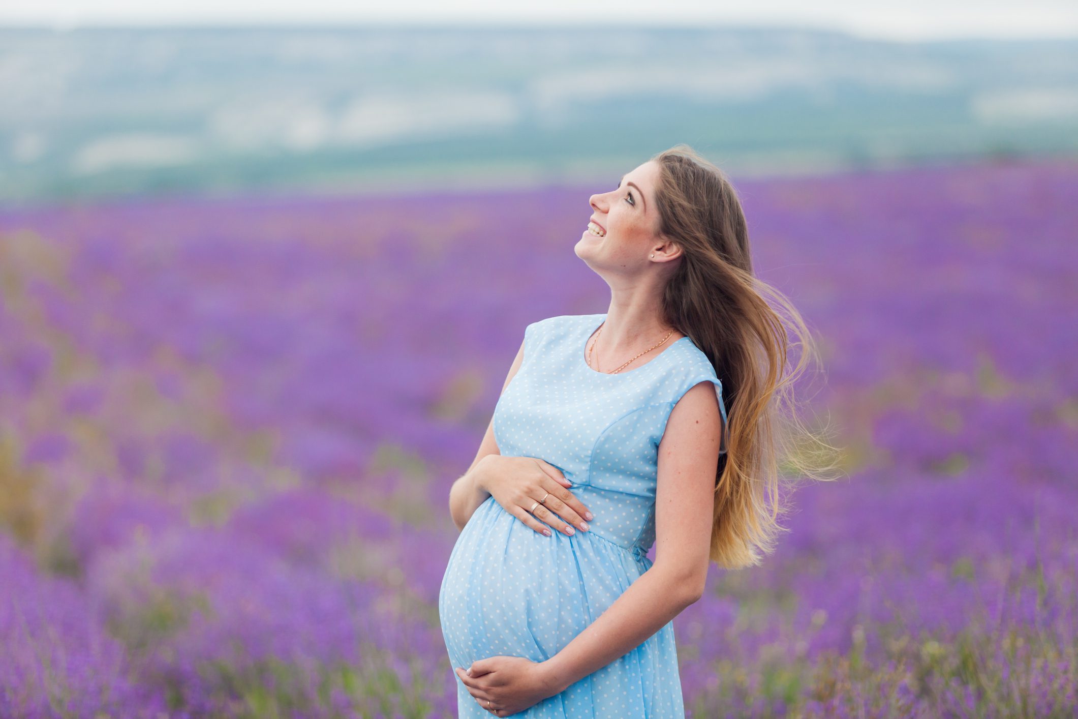 Pregnant woman in lavender field