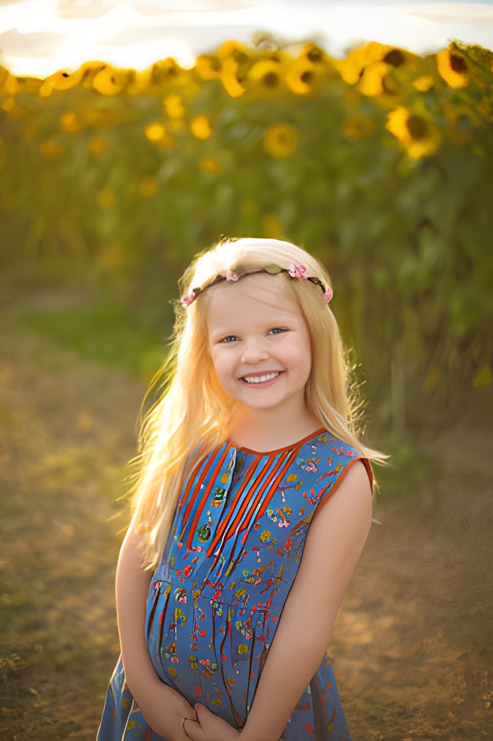 Child wearing floral dress and headband