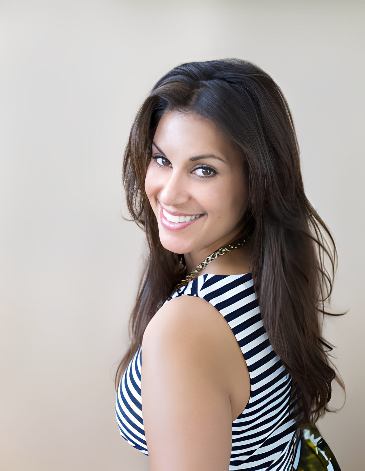 Smiling woman in striped dress